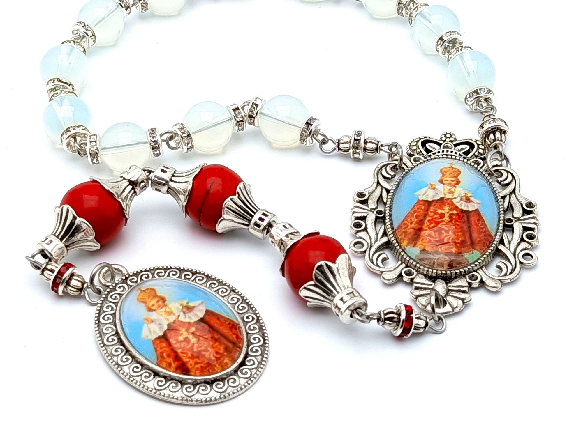 Infant of Prague unique rosary beads prayer chaplet with opal and red gemstone beads, silver picture centre and end medals.