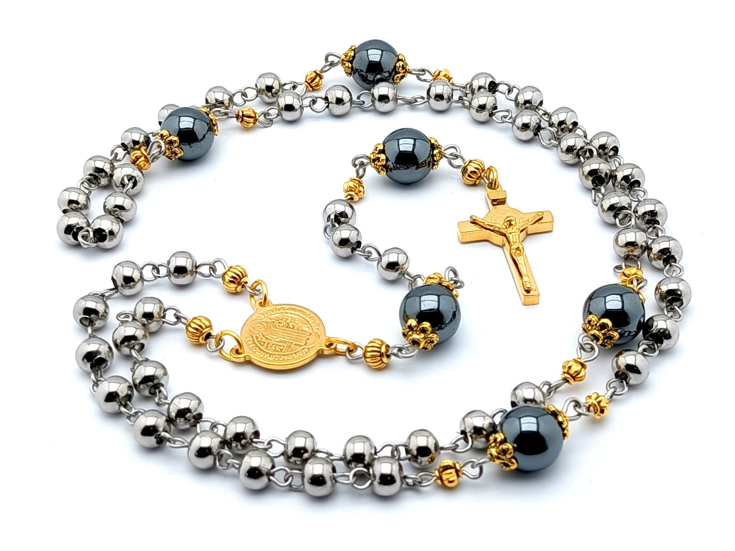 Saint Benedict unique rosary beads with stainless steel and hematite beads, stainless steel gold plated crucifix and gold plated stainless steel centre medal.