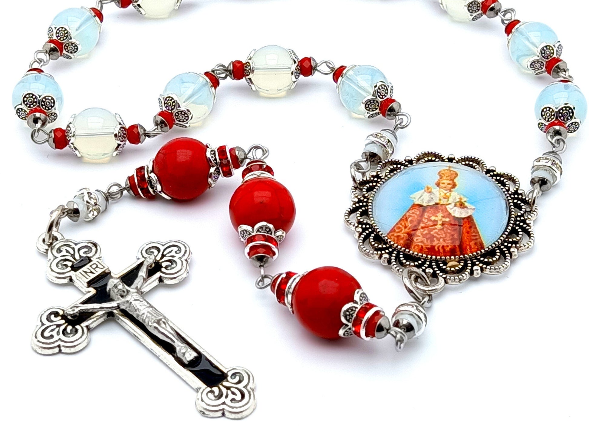 Infant of Prague unique rosary beads prayer chaplet with opal and red gemstone beads, black and silver enamel crucifix and picture centre medal.