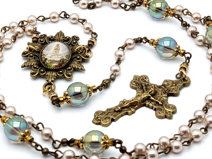 Our Lady of Fatima unique rosary beads with pink pearl and glass beads, bronze crucifix and picture centre medal and accessories.