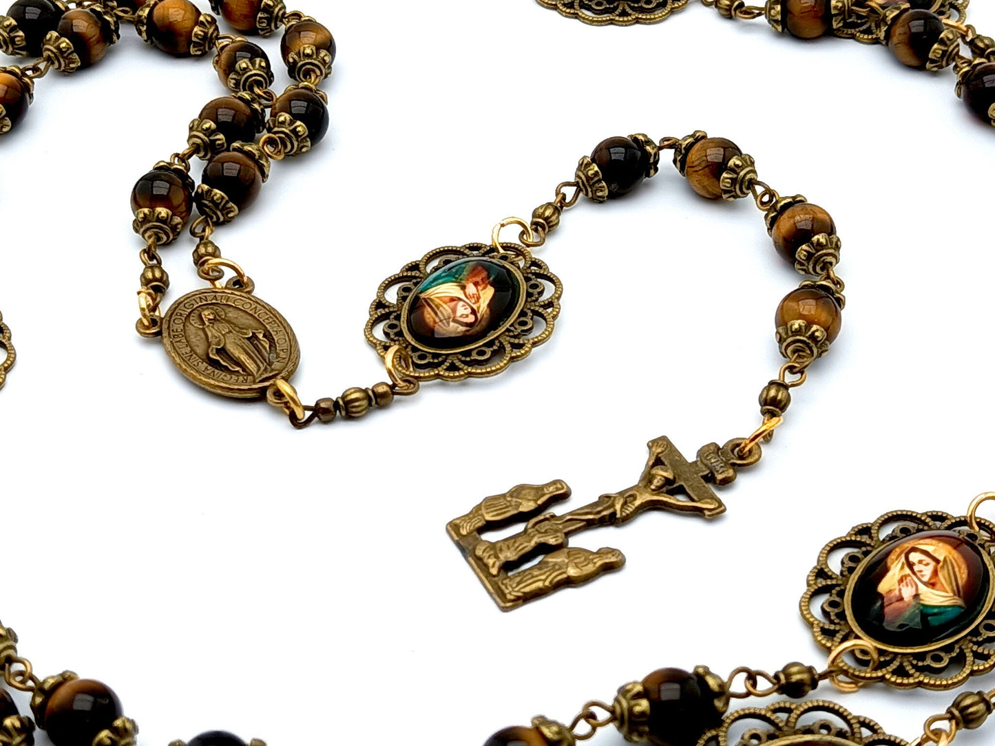 Our Lady of Sorrows unique rosary beads dolor rosary with tigers eye gemstone beads, bronze crucifix, picture medals and centre medal.