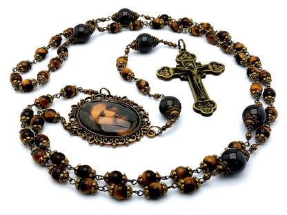 Holy face of Jesus unique rosary beads with tigers eye and garnet gemstone beads, bronze twelve apostles crucifix and Holy face centre medal.