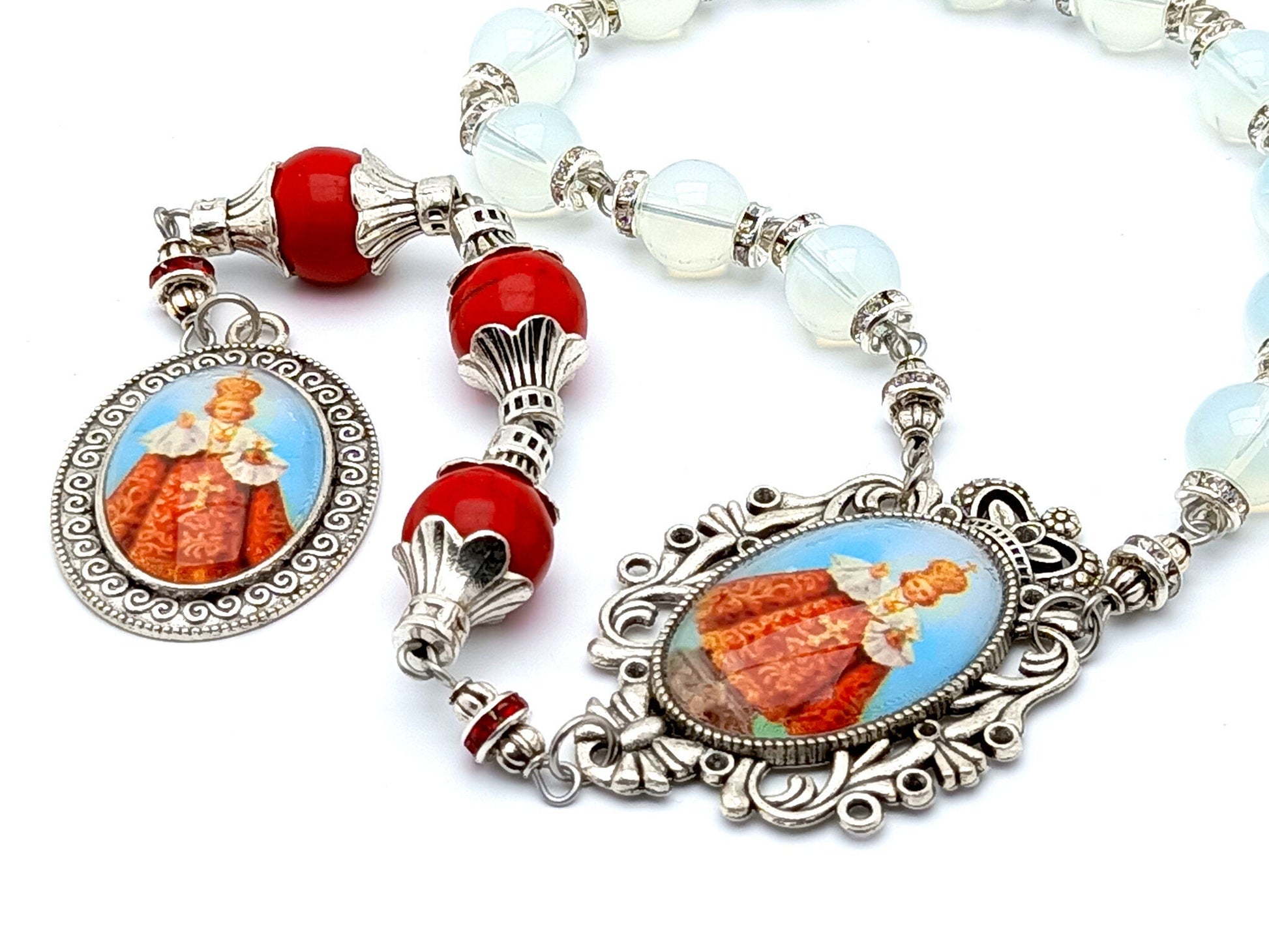 Infant of Prague unique rosary beads prayer chaplet with opal and red gemstone beads, silver picture centre and end medals.