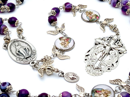 Our Lady of Mount Carmel unique rosary beads with purple agate gemstone and silver winged dove  beads, silver Holy Angels crucifix and centre medal.