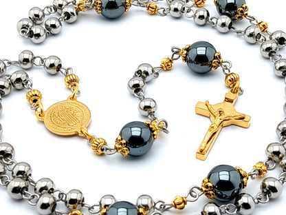 Saint Benedict unique rosary beads with stainless steel and hematite beads, stainless steel gold plated crucifix and gold plated stainless steel centre medal.