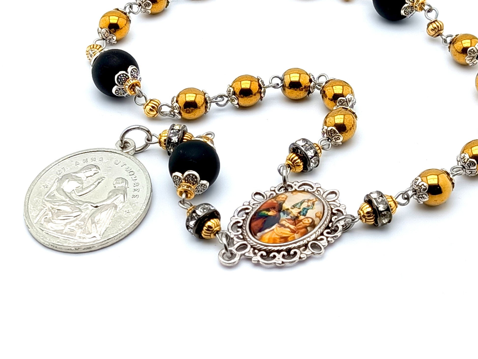 Saint Ann unique rosary beads prayer chaplet with gold hematite and onyx gemstone beads, silver picture centre medal and end medal.