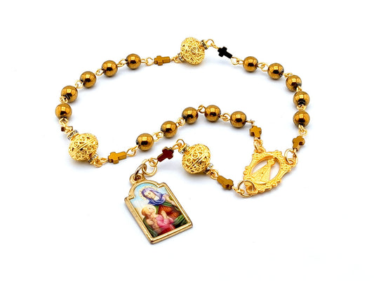 Saint Ann unique rosary beads prayer chaplet with golden hematite and filligree beads, golden centre medal and picture end medal.