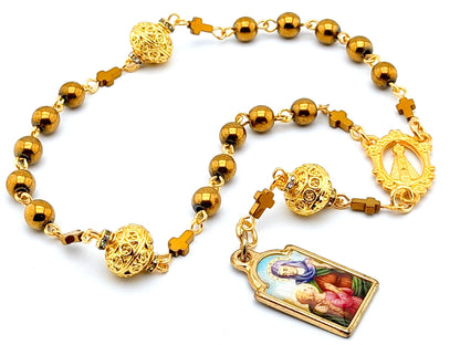 Saint Ann unique rosary beads prayer chaplet with golden hematite and filligree beads, golden centre medal and picture end medal.