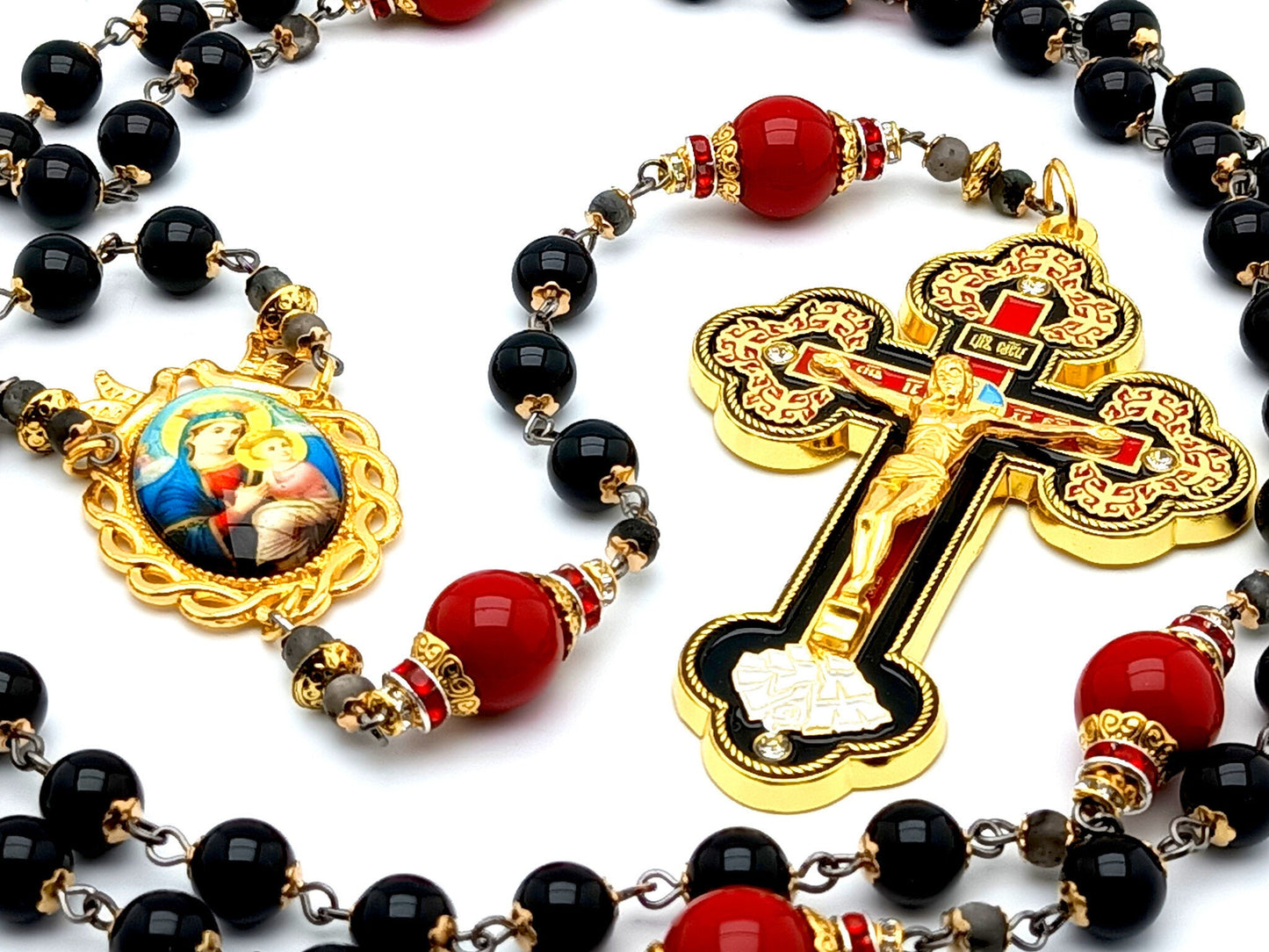 Our Lady of Perpetual Help unique rosary beads with onyx and red gemstone beads, ornate enamel crucifix and golden picture centre medal.