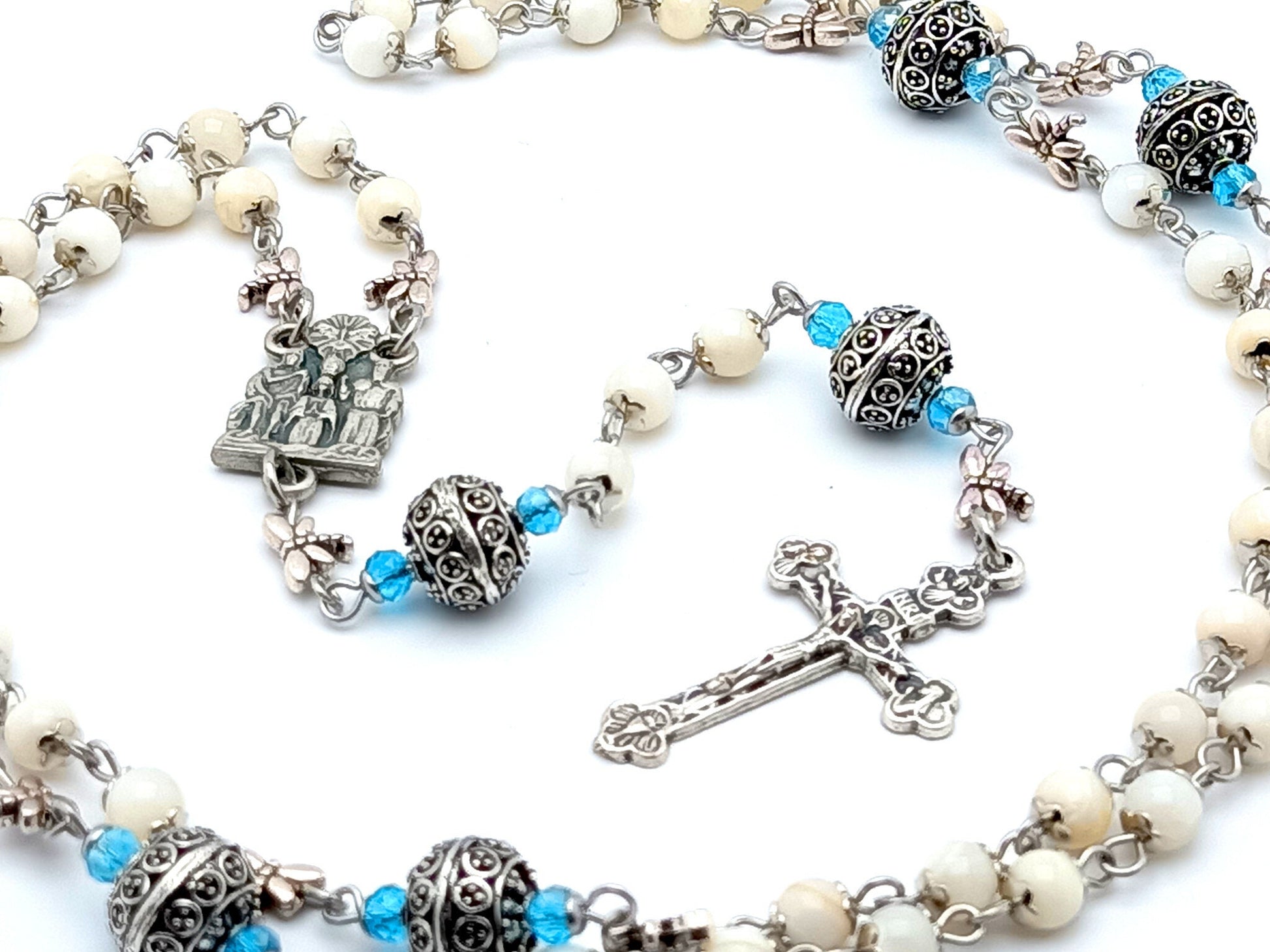 The coronation of the Blessed Virgin Mary unique rosary beads with mother of pearl and silver beads, Holy Trinity crucifix and silver centre medal.