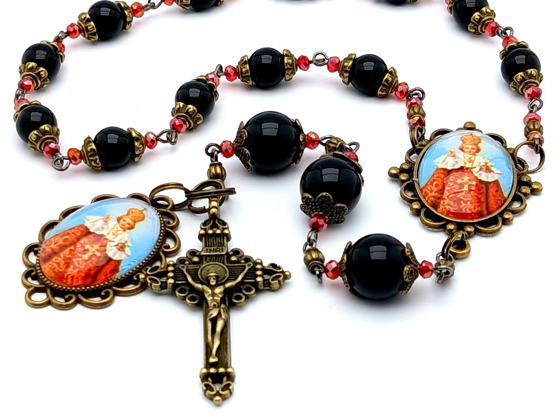 infant of Prague unique rosary beads prayer chaplet with onyx gemstone and red glass beads, brass crucifix and picture centre and end medals.