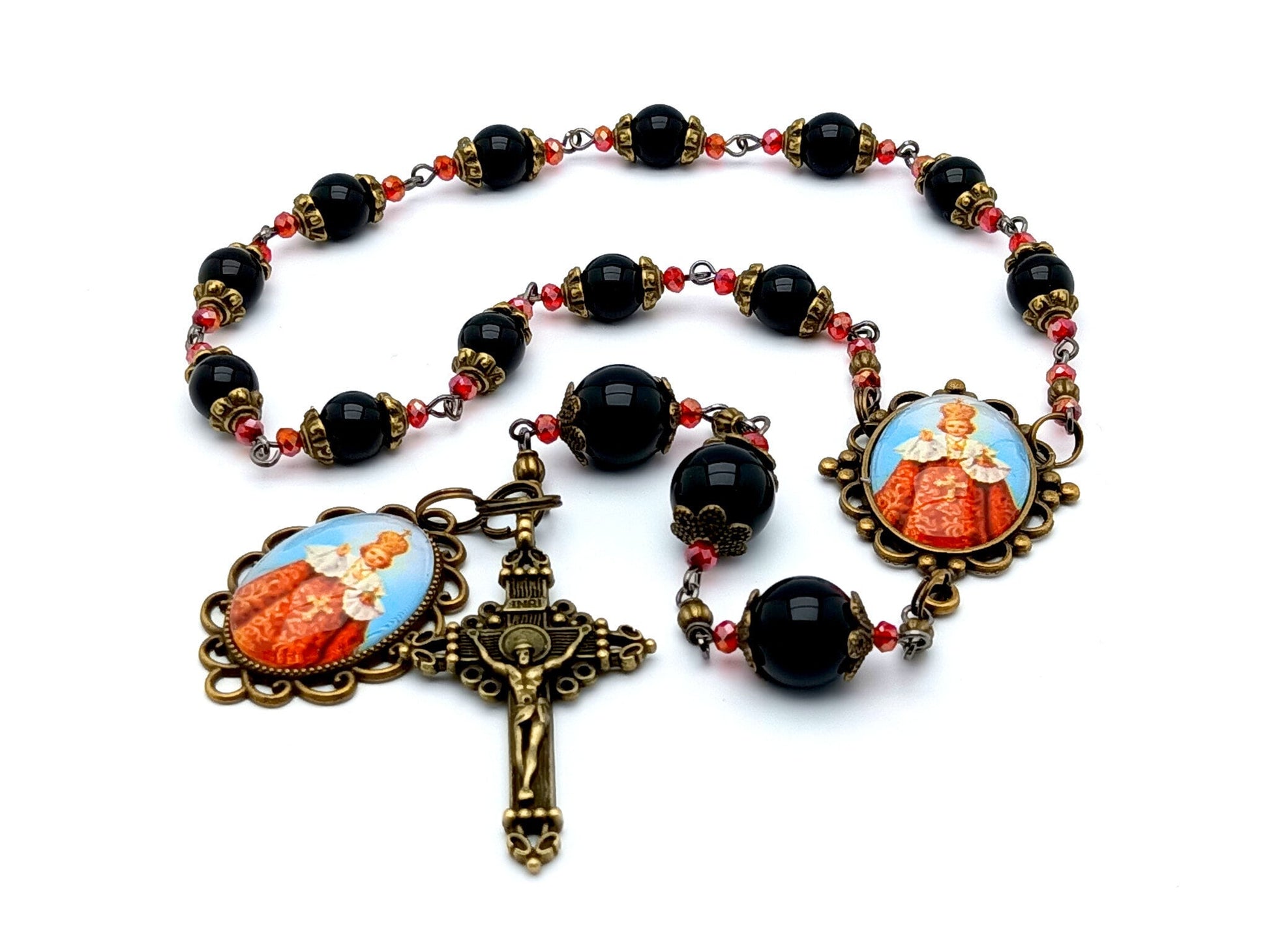 infant of Prague unique rosary beads prayer chaplet with onyx gemstone and red glass beads, brass crucifix and picture centre and end medals.