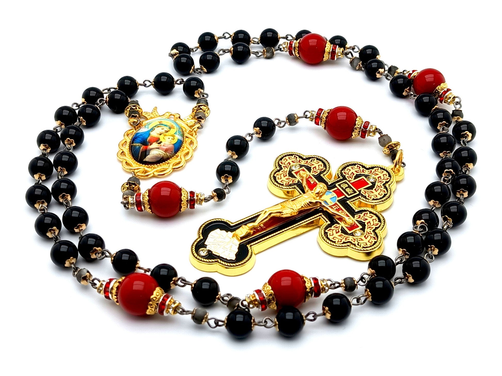 Our Lady of Perpetual Help unique rosary beads with onyx and red gemstone beads, ornate enamel crucifix and golden picture centre medal.