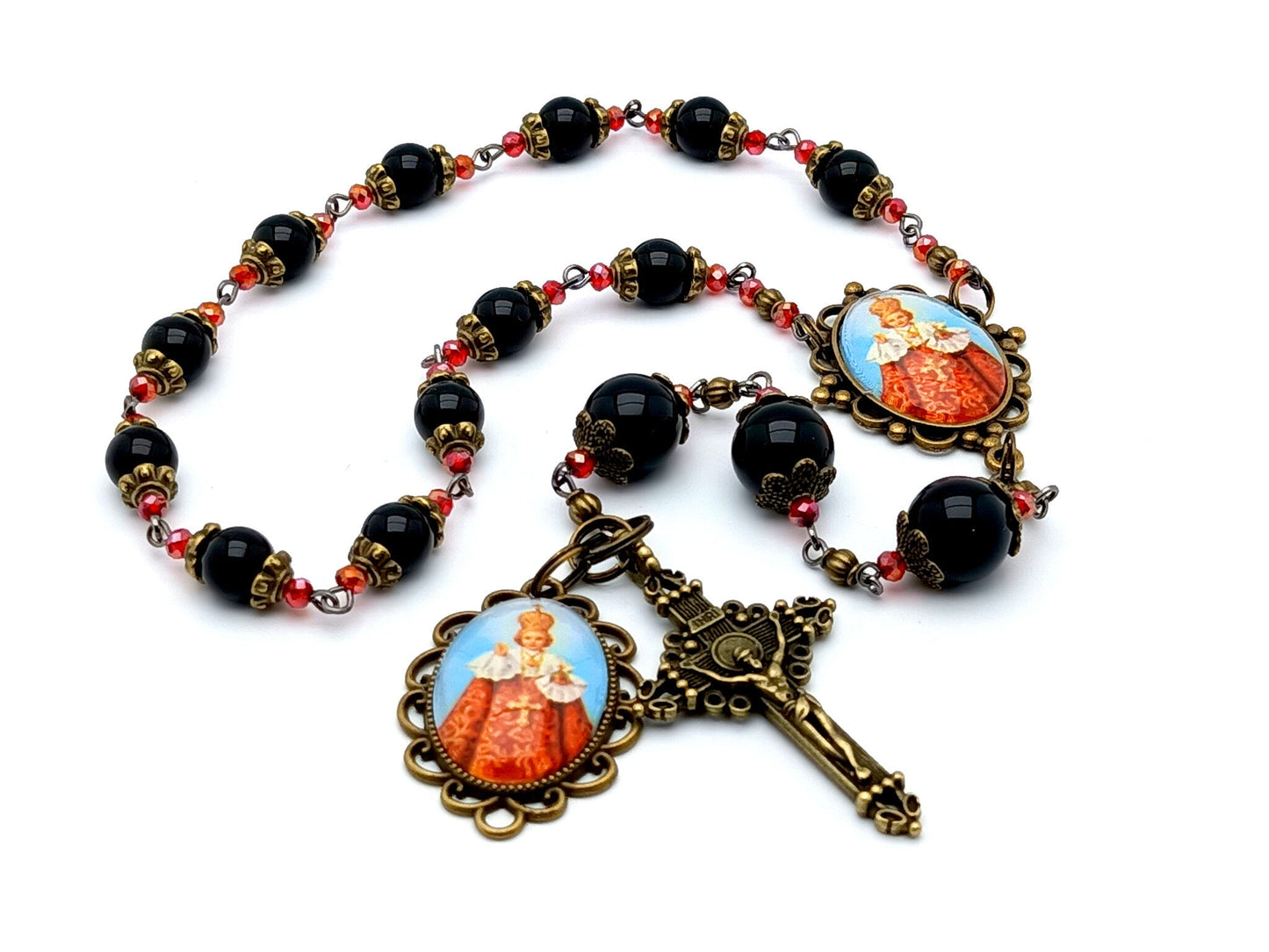 infant of Prague unique rosary beads prayer chaplet with onyx gemstone and red glass beads, brass crucifix and picture centre and end medals.