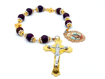 Our Lady of Charity unique rosary beads prayer chaplet with purple glass and gold cross beads, St Benedict crucifix and picture end medal.