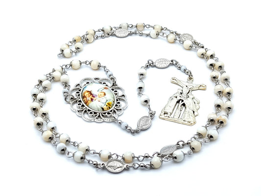 Mother of pearl baptismal unique rosary beads with mother of pearl and miraculous medal linking beads, passion crucifix and picture centre medal.