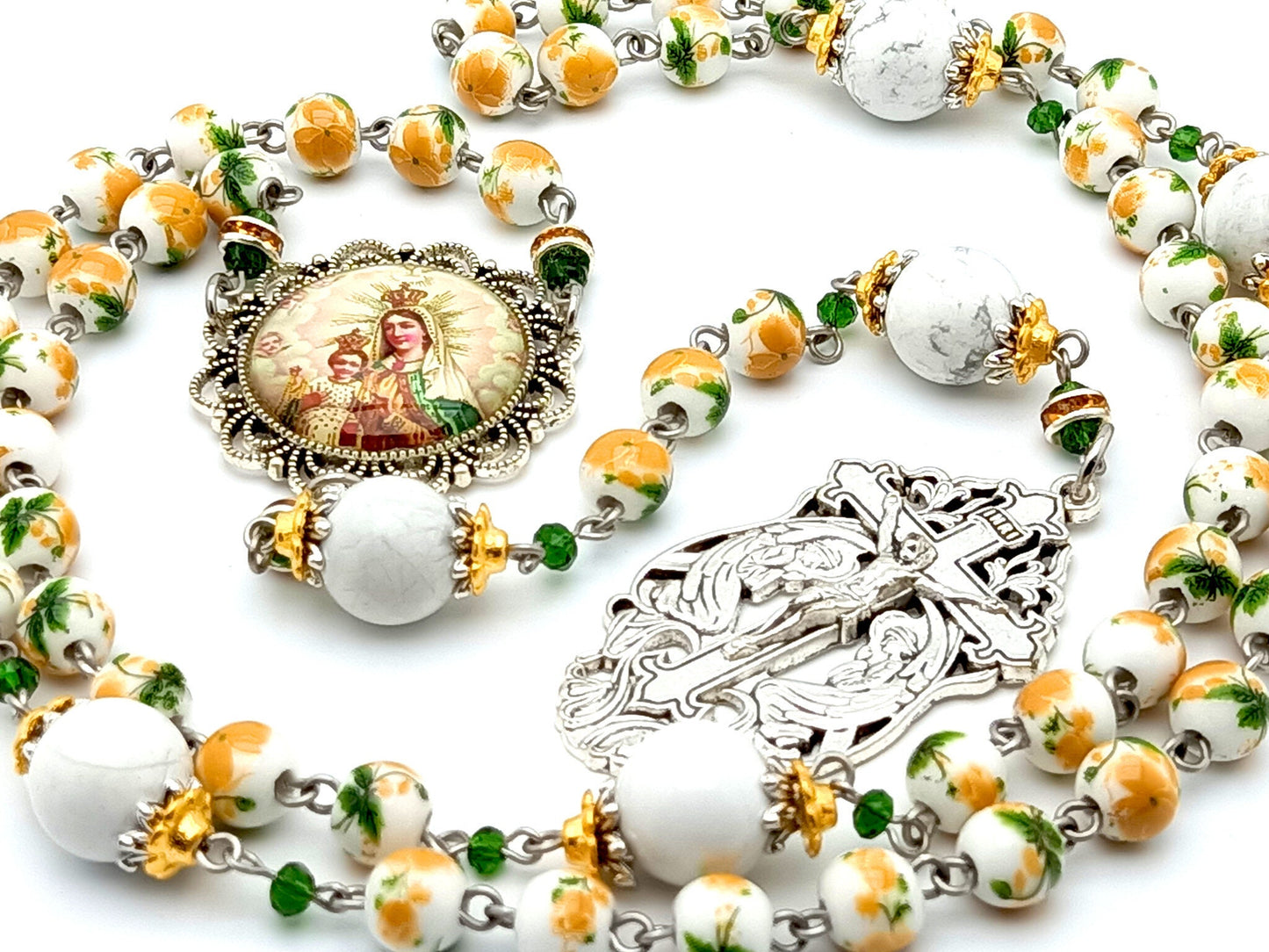 Our Lady of Mount Carmel unique rosary beads with floral porcelain and white howlite gemstone beads, silver angel crucifix and picture centre medal.