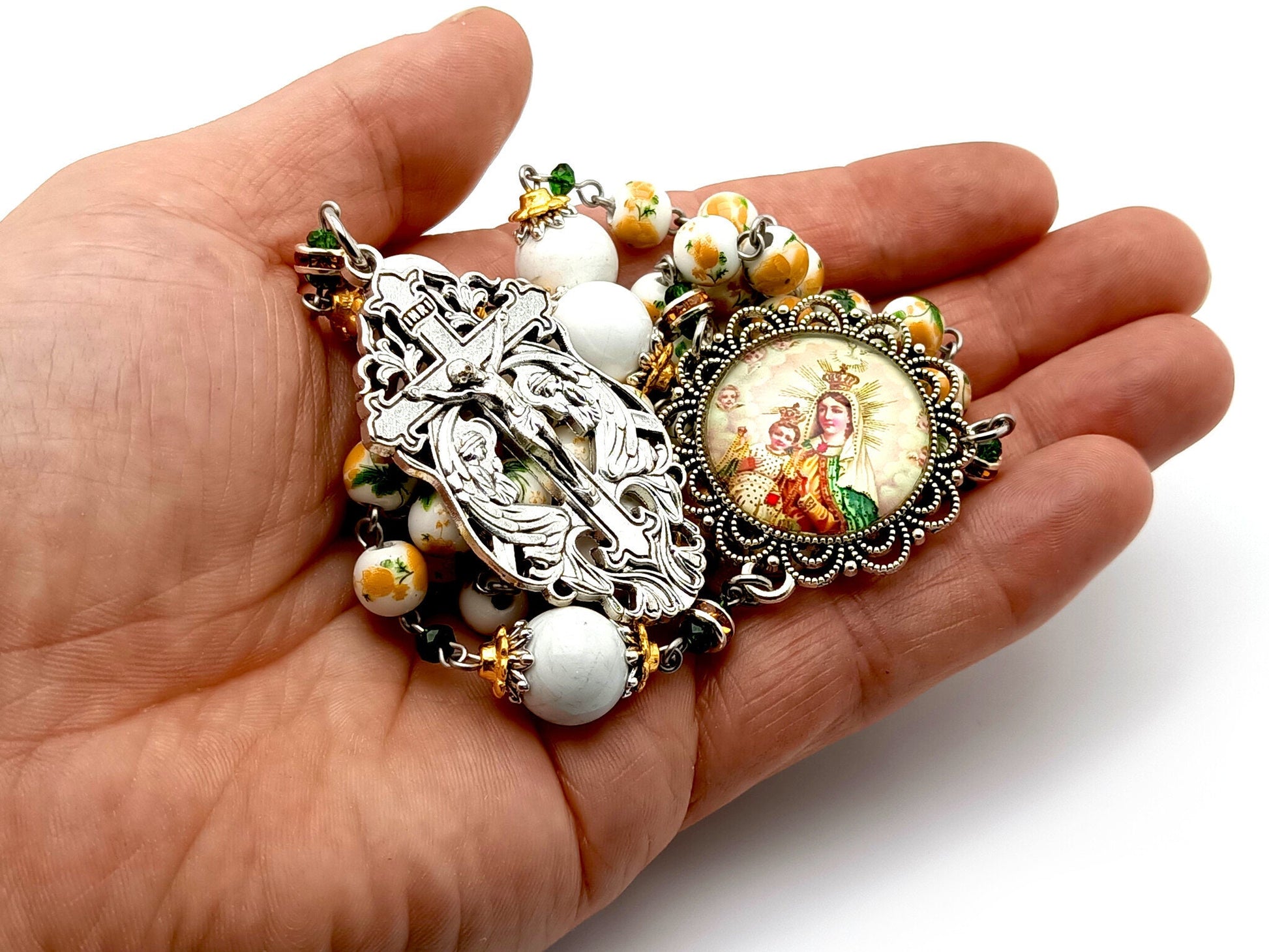 Our Lady of Mount Carmel unique rosary beads with floral porcelain and white howlite gemstone beads, silver angel crucifix and picture centre medal.
