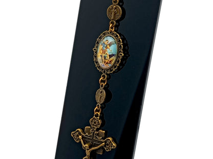 Saint Michael unique rosary beads purse clip keychain with picture medal and linking brass Saint Benedict medals and a brass crucifix.