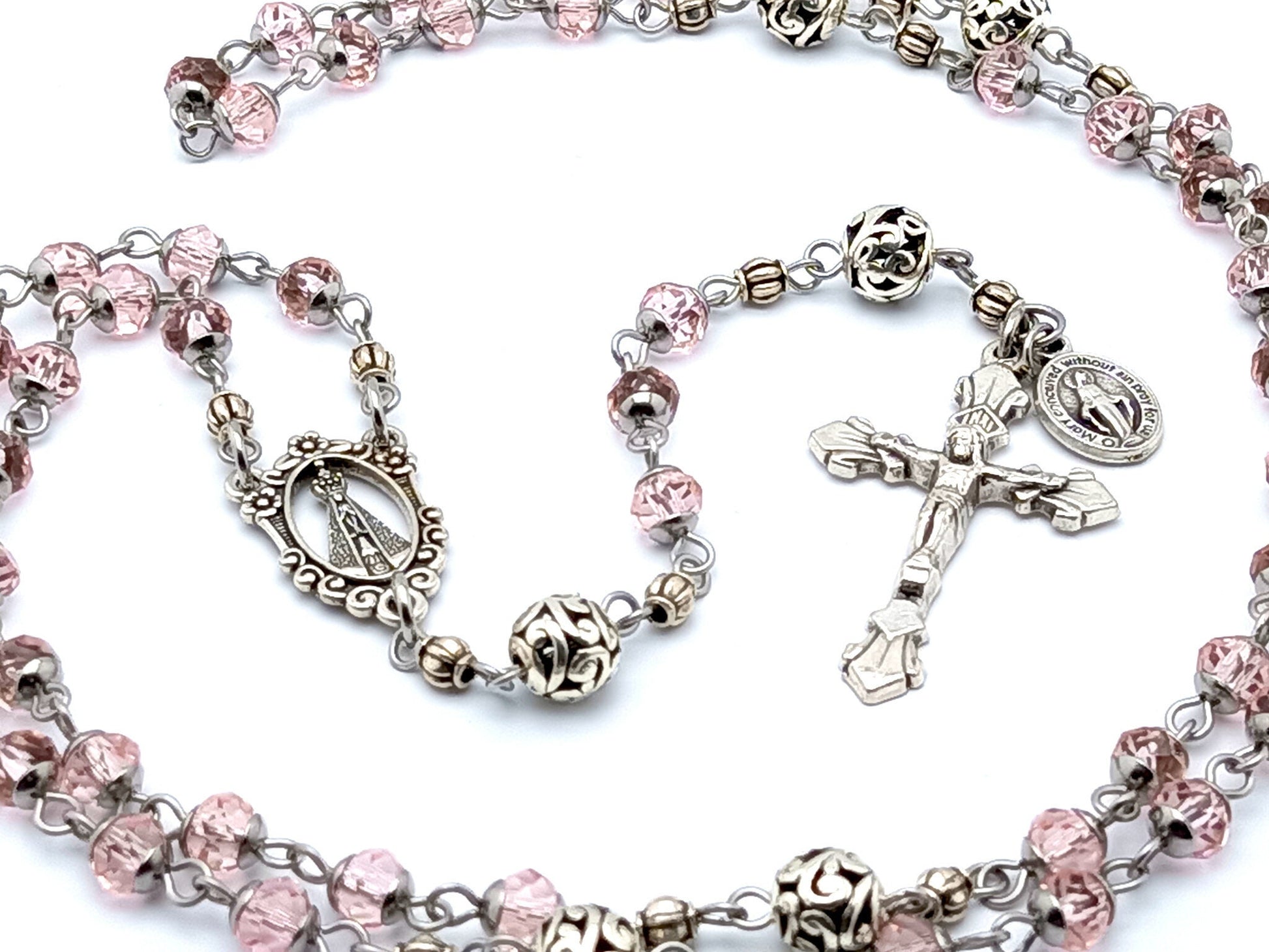 Our Lady of Charity unique rosary beads pink glass and Tibetan silver rosary beads with silver crucifix and a Miraculous medal.
