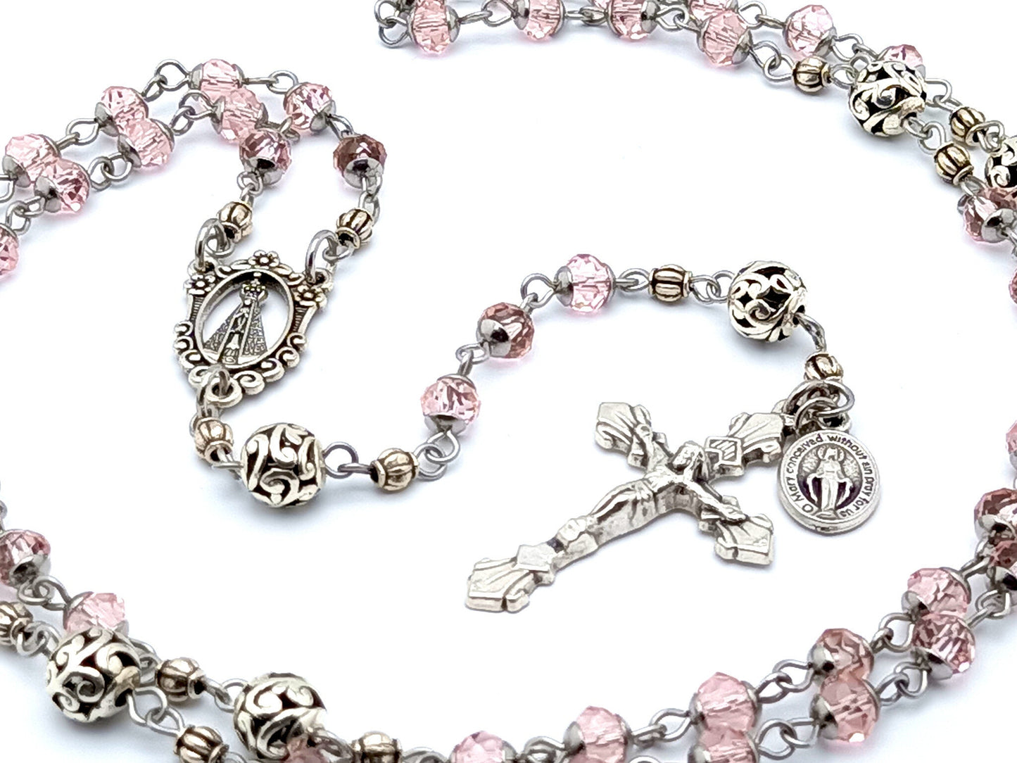 Our Lady of Charity unique rosary beads pink glass and Tibetan silver rosary beads with silver crucifix and a Miraculous medal.