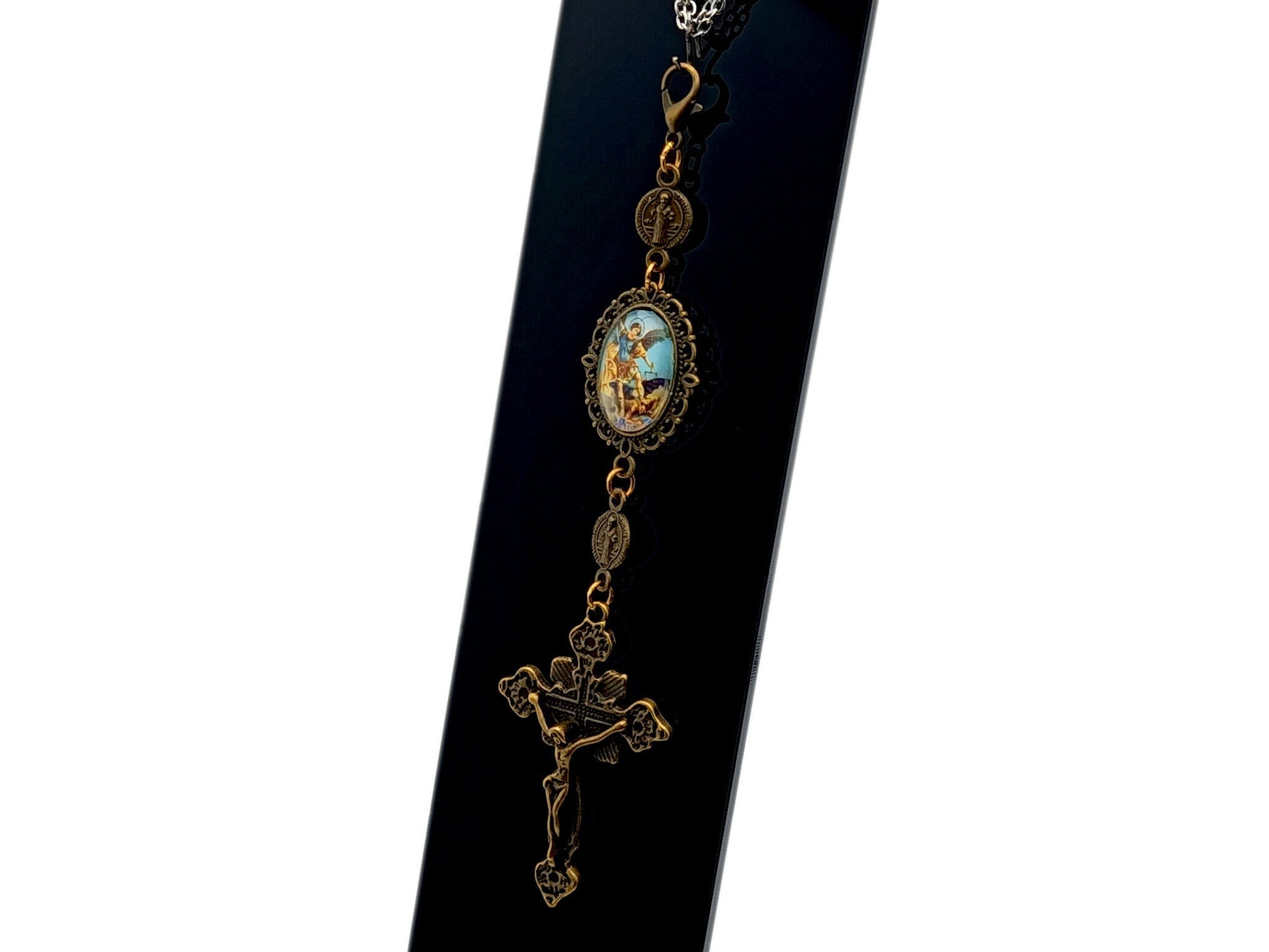 Saint Michael unique rosary beads purse clip keychain with picture medal and linking brass Saint Benedict medals and a brass crucifix.