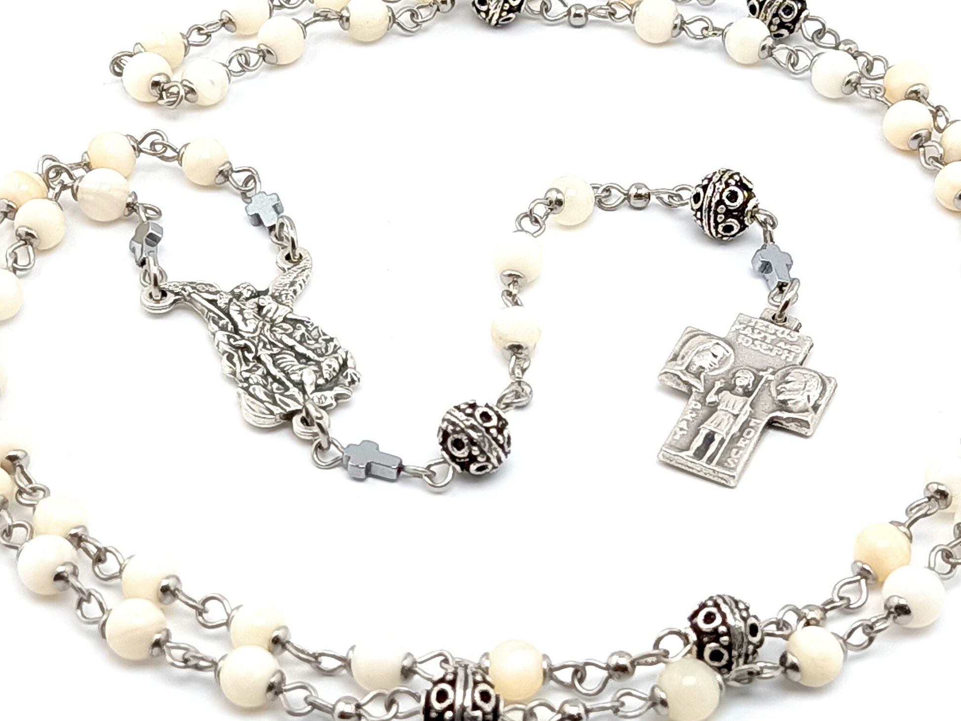 Saint Michael unique rosary beads mother of pearl rosary beads with Saint Christopher and the Holy Family silver cross.