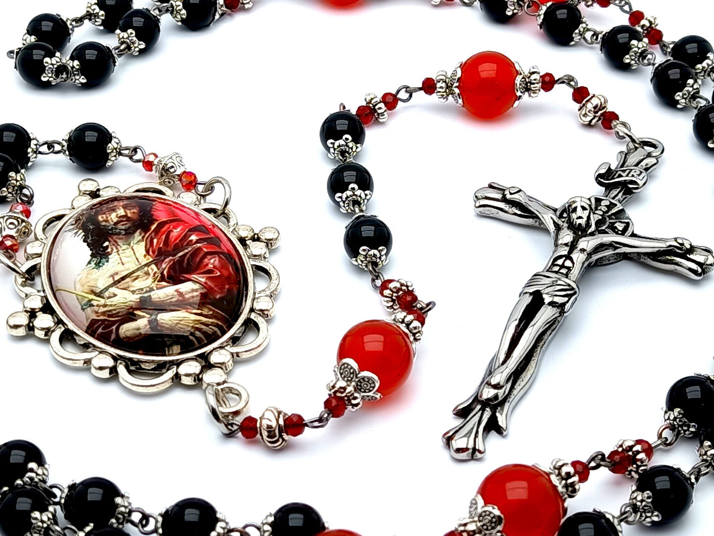 The Crucifixion unique rosary beads with onyx and ruby gemstone beads and stainless steel crucifix.