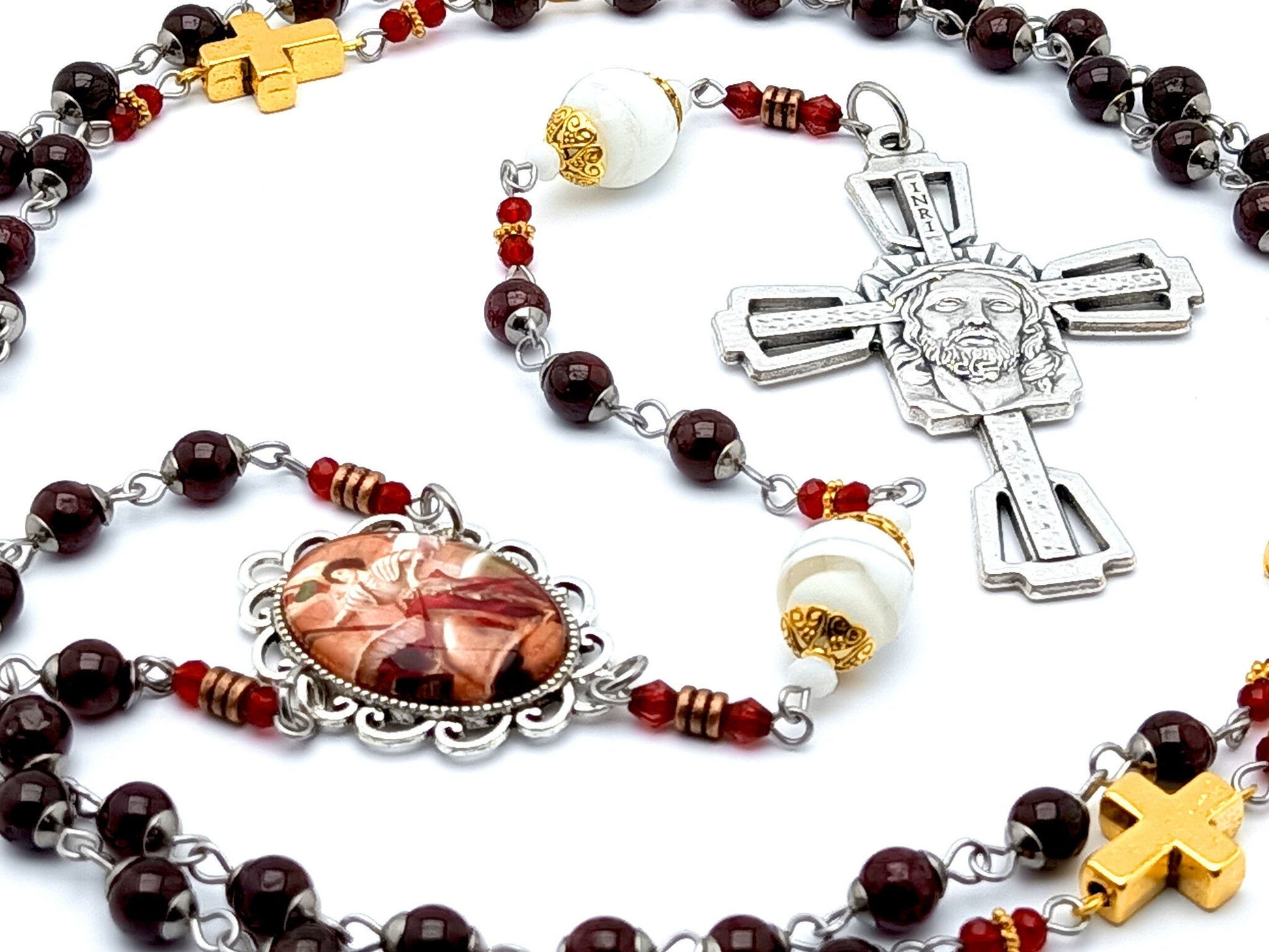 Saint Joan of Arc unique rosary beads with garnet gemstone, blown glass bead and gold linking cross beads and Crowning of Thorns crucifix.