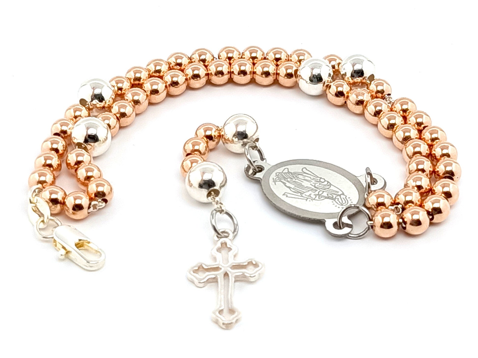 Sterling silver rose gold unique rosary beads rosary bracelet with Miraculous medal centre and 925 sterling silver linking cross.