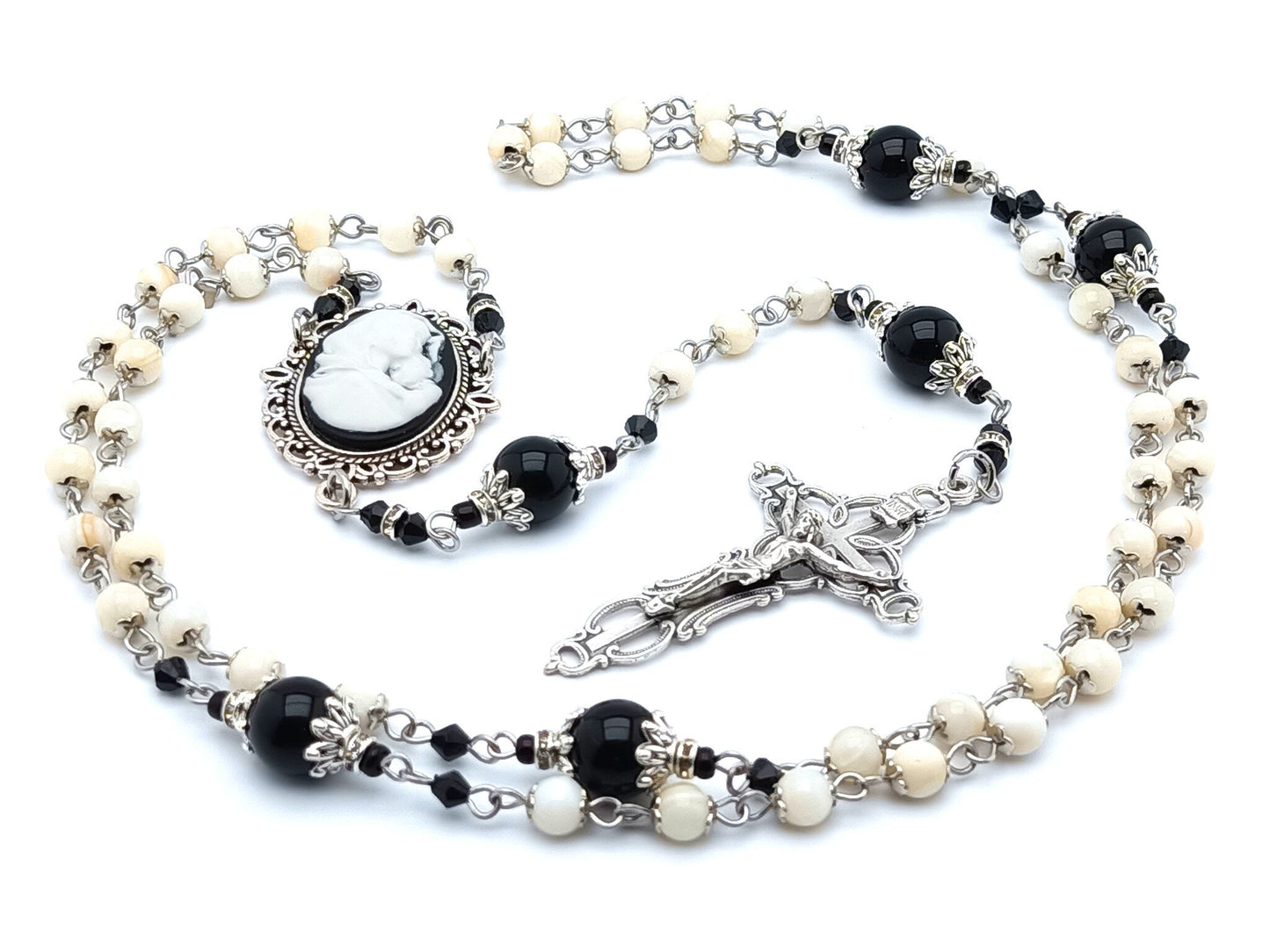 Madonna and child cameo unique rosary beads with mother of pearl and onyx rosary beads with filigree crucifix.