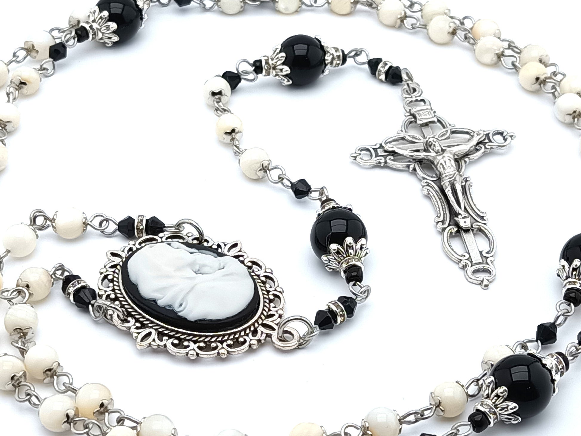 Madonna and child cameo unique rosary beads with mother of pearl and onyx rosary beads with filigree crucifix.