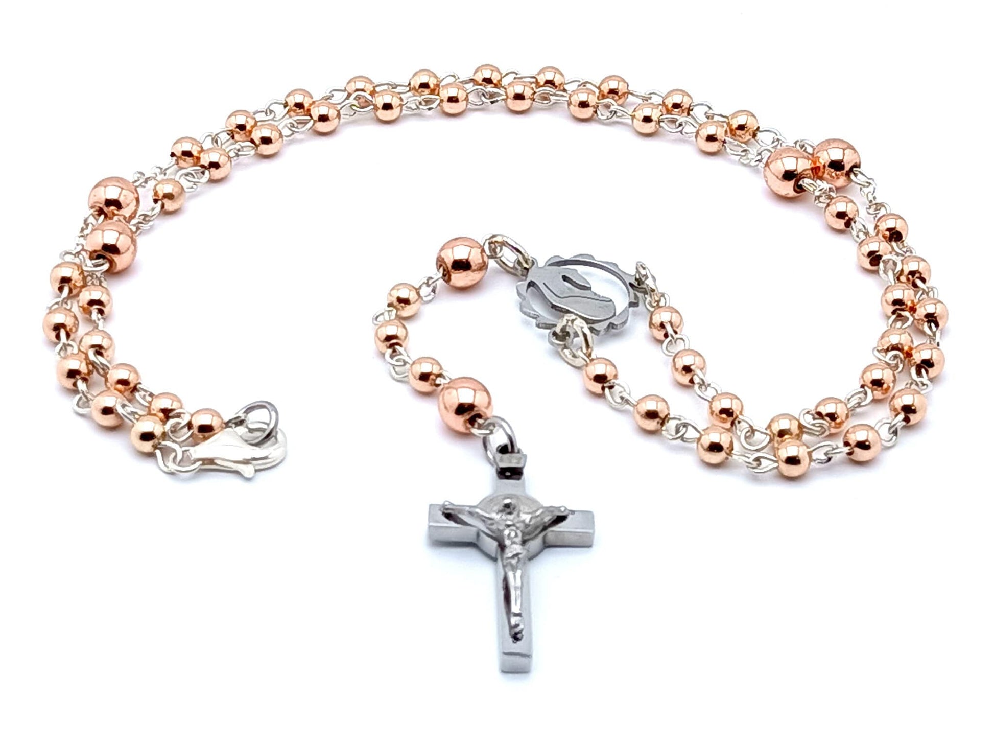 Sterling silver rose gold Madonna unique rosary beads with stainless steel Saint Benedict crucifix and 925 sterling silver wire.