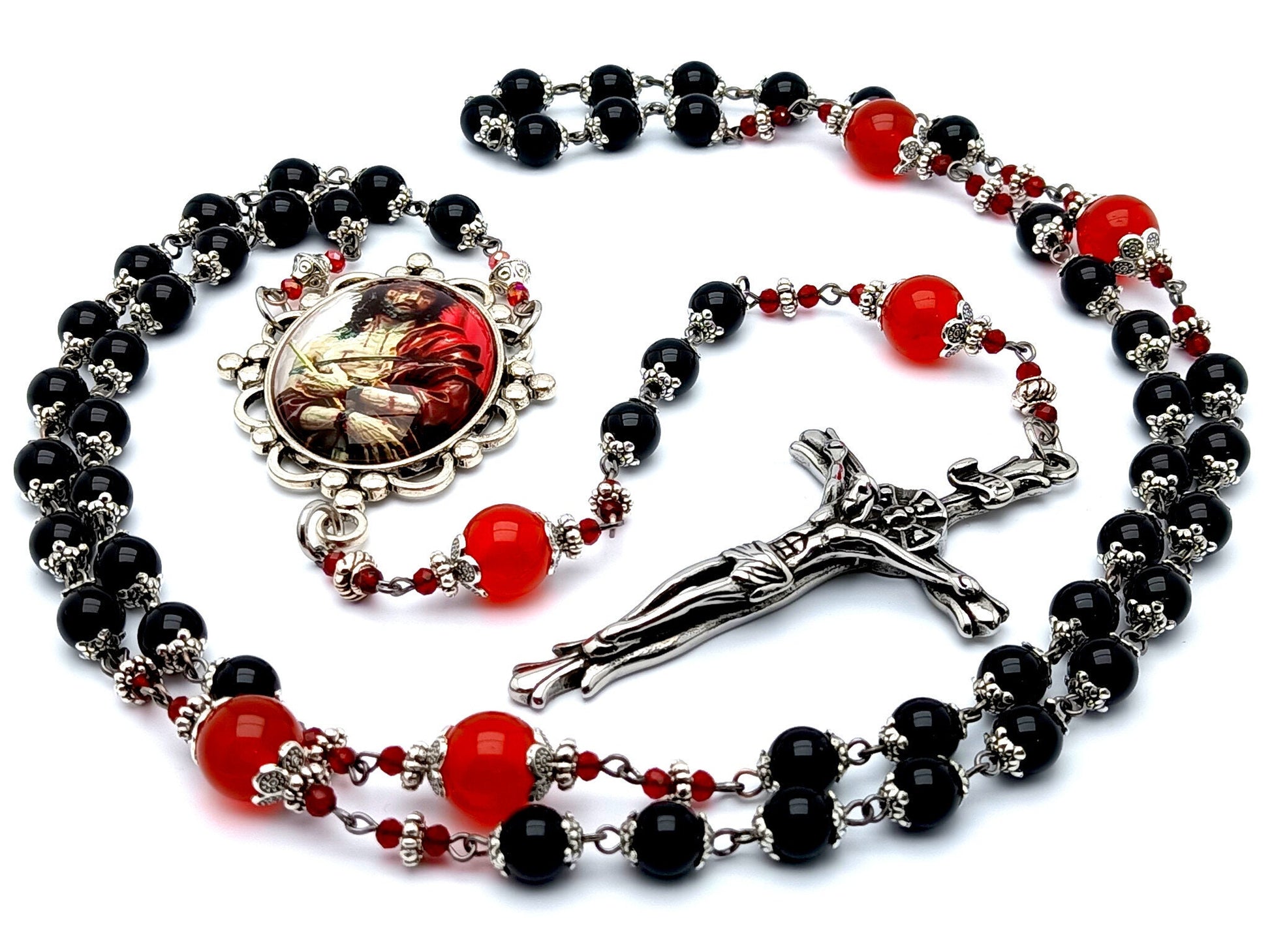 The Crucifixion unique rosary beads with onyx and ruby gemstone beads and stainless steel crucifix.