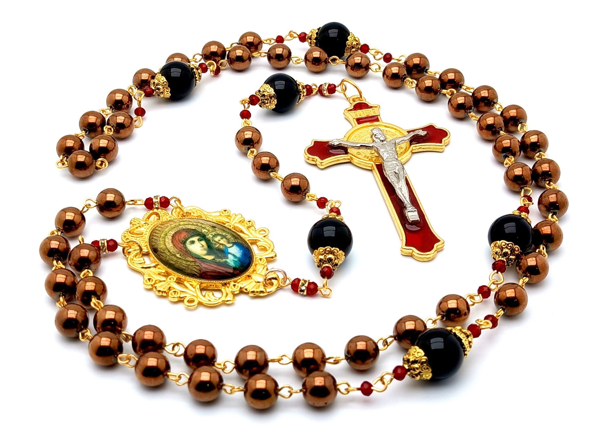 Our Lady of Perpetual Help unique rosary beads with hematite and onyx gemstone beads and red and gold enamel Saint Benedict crucifix.