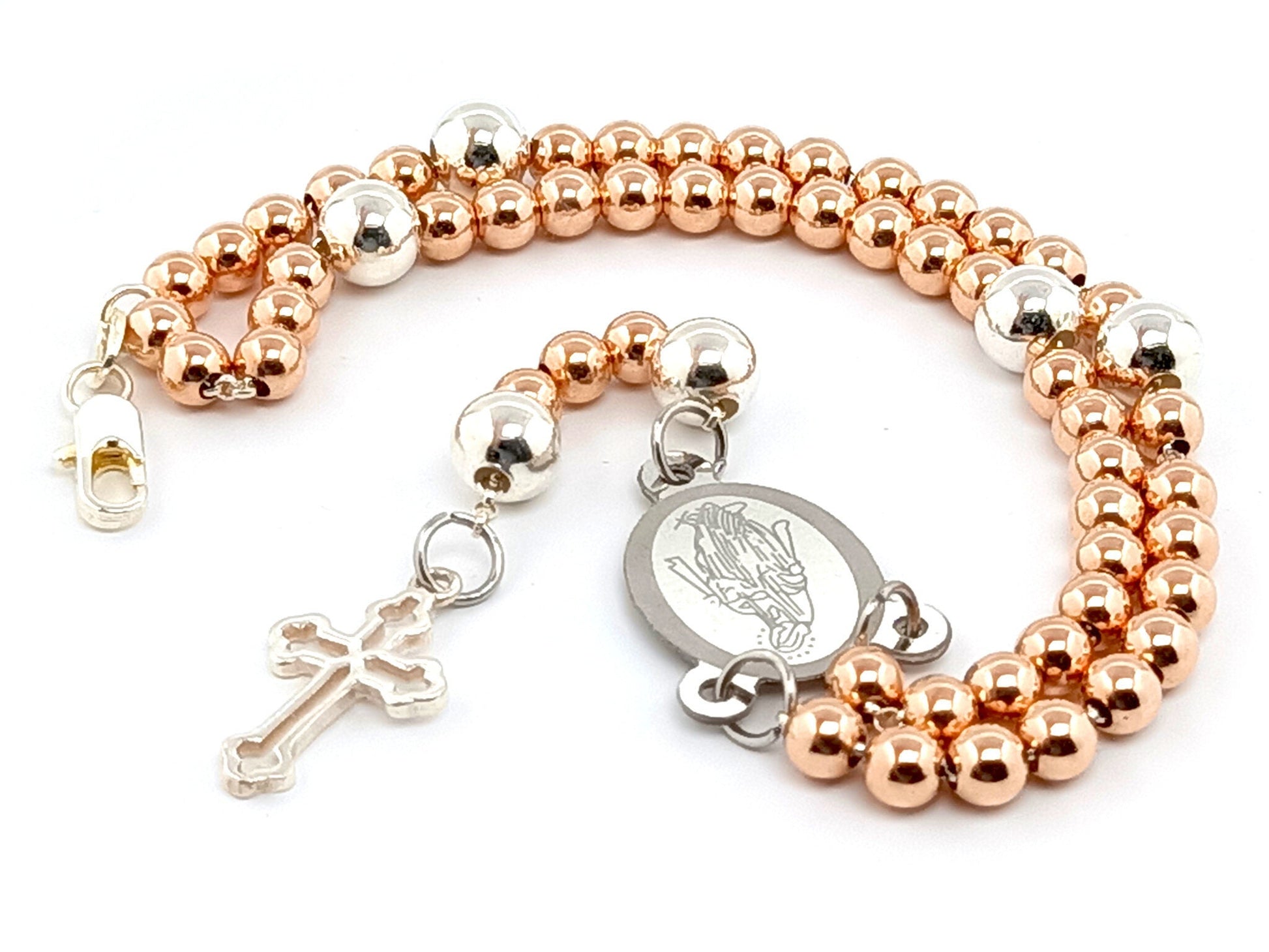 Sterling silver rose gold unique rosary beads rosary bracelet with Miraculous medal centre and 925 sterling silver linking cross.