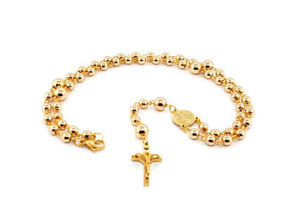 Saint Benedict unique rosary beads  necklace with gold hematite beads and stainless steel gold plated Saint Benedict crucifix.