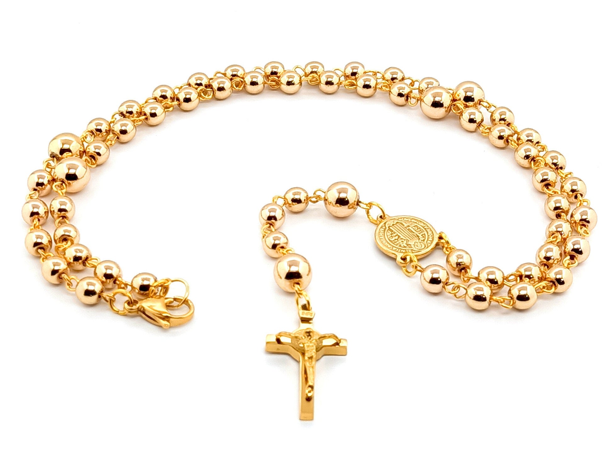 Saint Benedict unique rosary beads  necklace with gold hematite beads and stainless steel gold plated Saint Benedict crucifix.