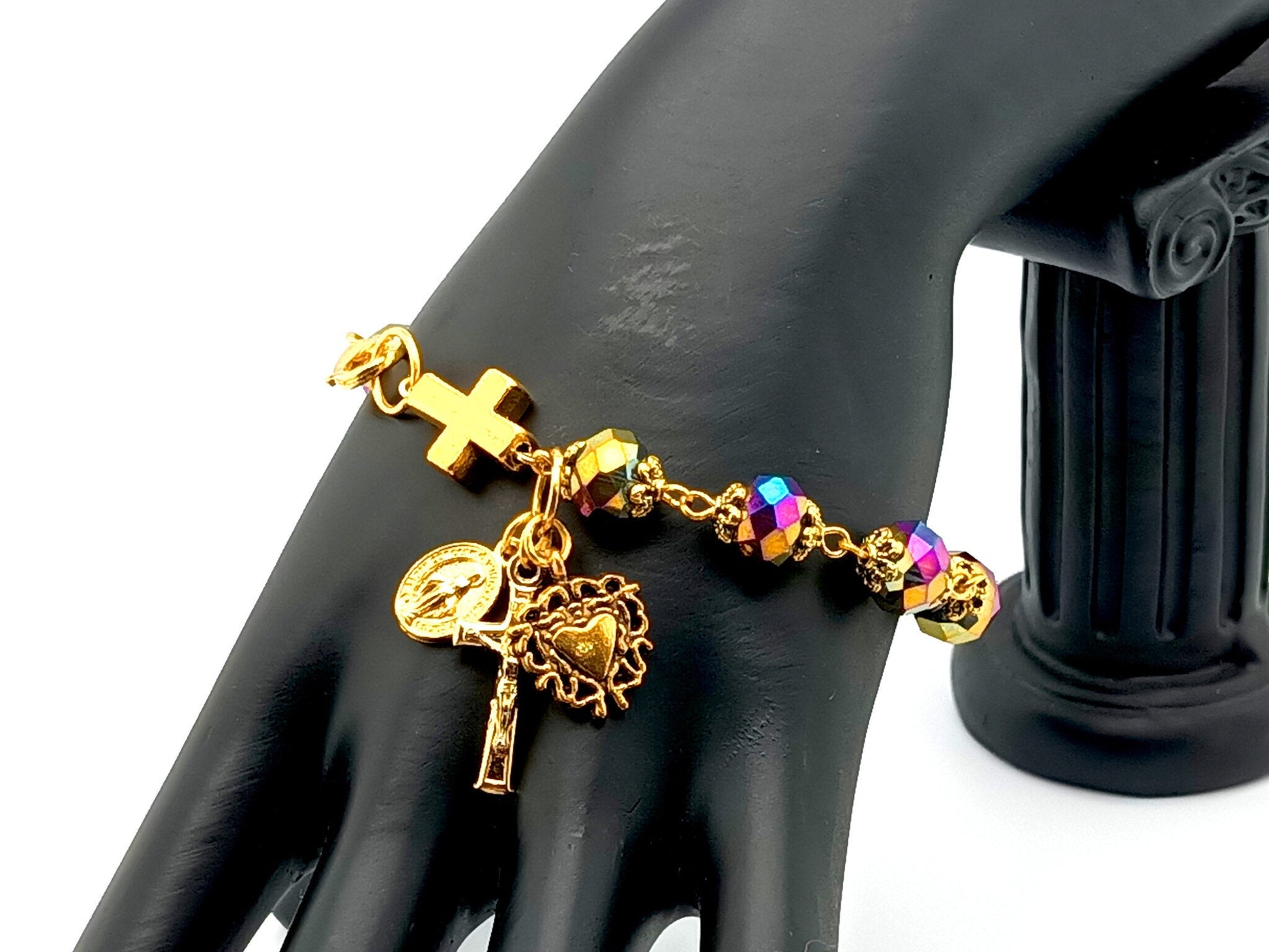 Miraculous medal unique rosry beads single decade rosary bracelet with purple and gold faceted glass beads and gold heart medal and crucifix.