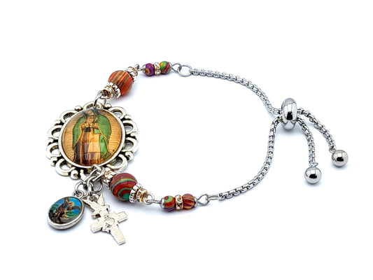 Our Lady of Guadalupe unqie rosary beads adjustable stainless steel bracelet with malachite gemstones and Holy Spirit cross and Saint Michael medal.